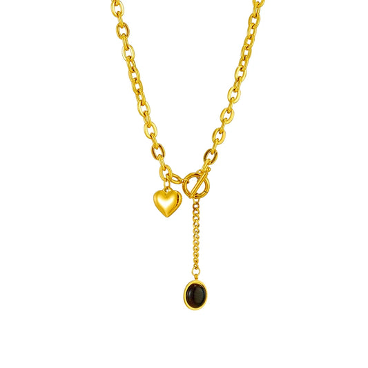 Stainless steel chain necklace featuring a heart charm and a black pendant. Perfect for layering